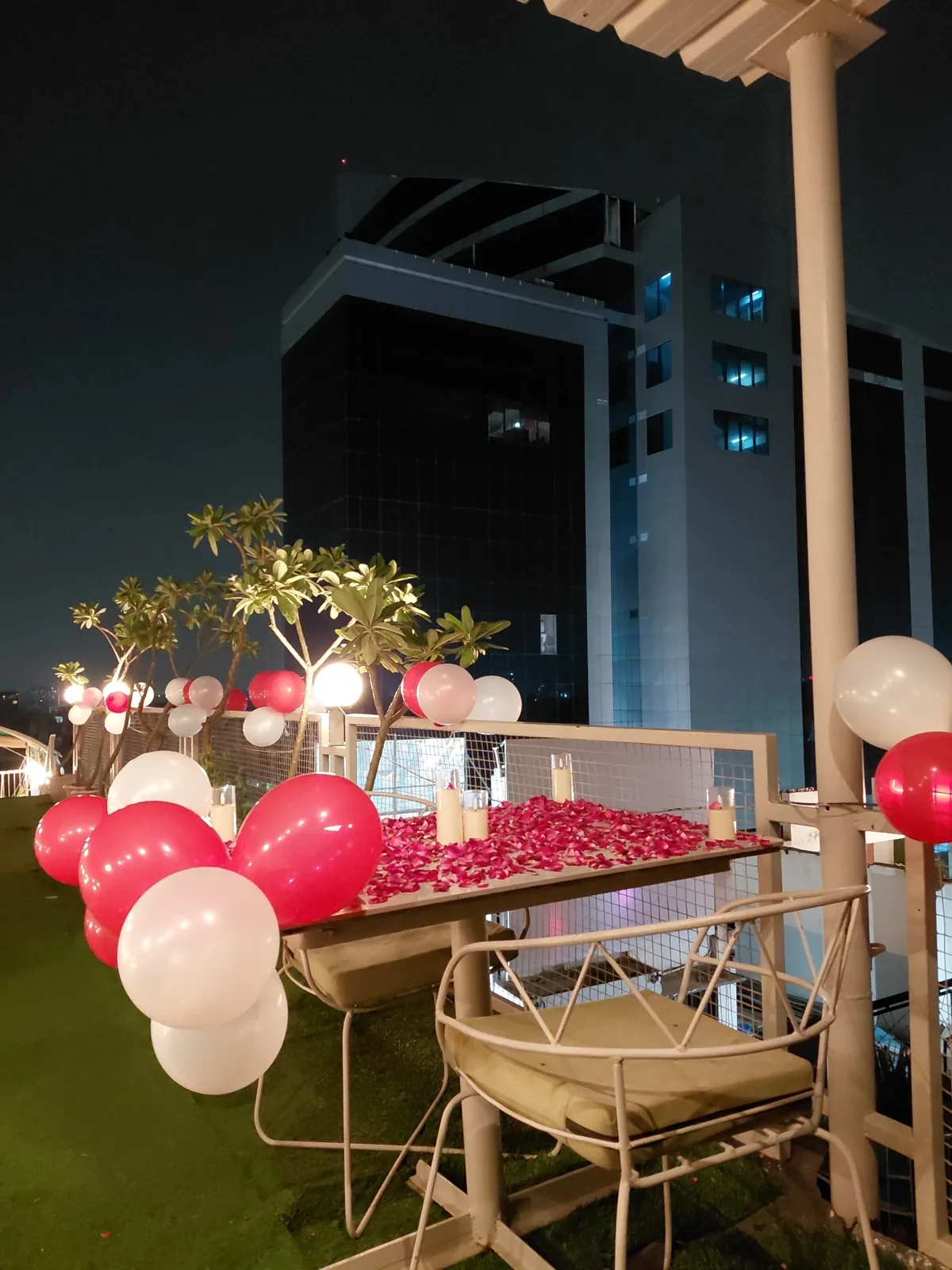 Candle light dinner table setup for couples at Chairish Cafe Jaipur