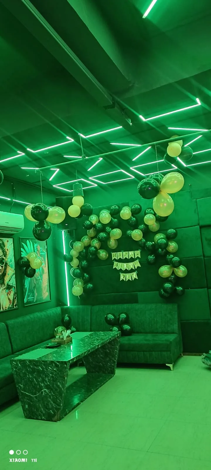 Premium birthday decoration inside Chairish Cafe party hall Malviya Nagar