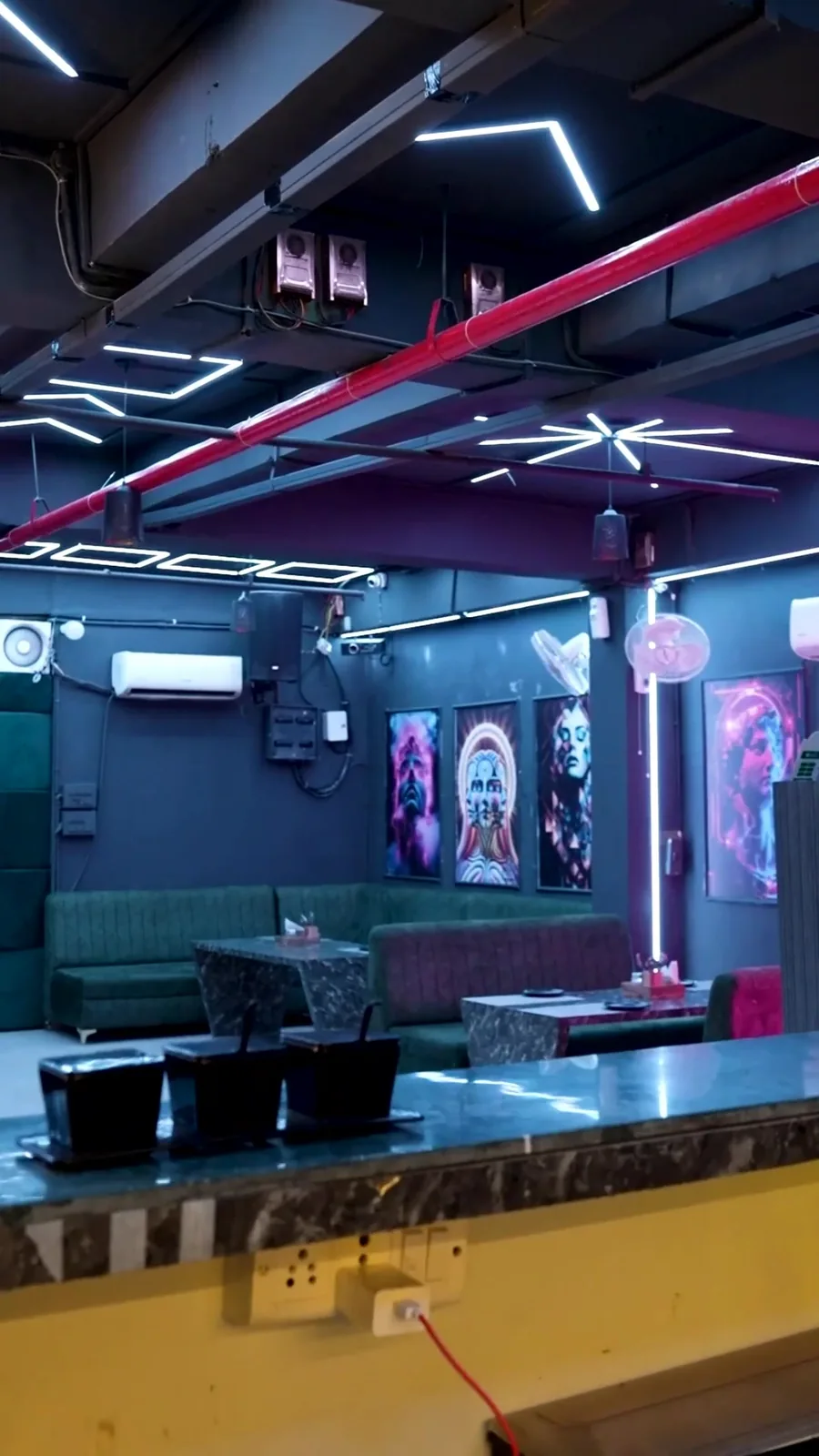 Chairish Cafe indoor party hall with DJ setup in Jaipur