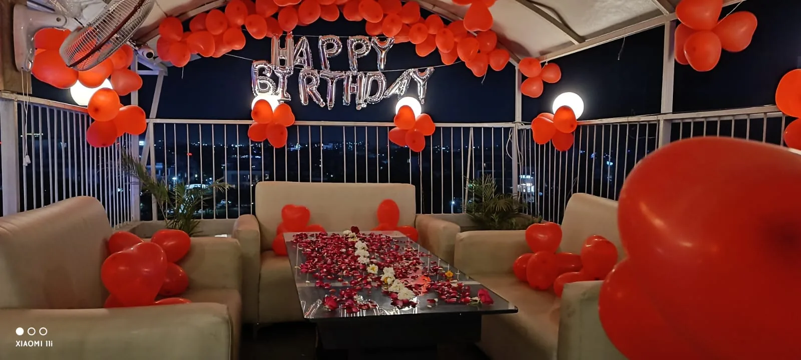Rooftop birthday table decoration at Chairish Cafe behind WTP Jaipur